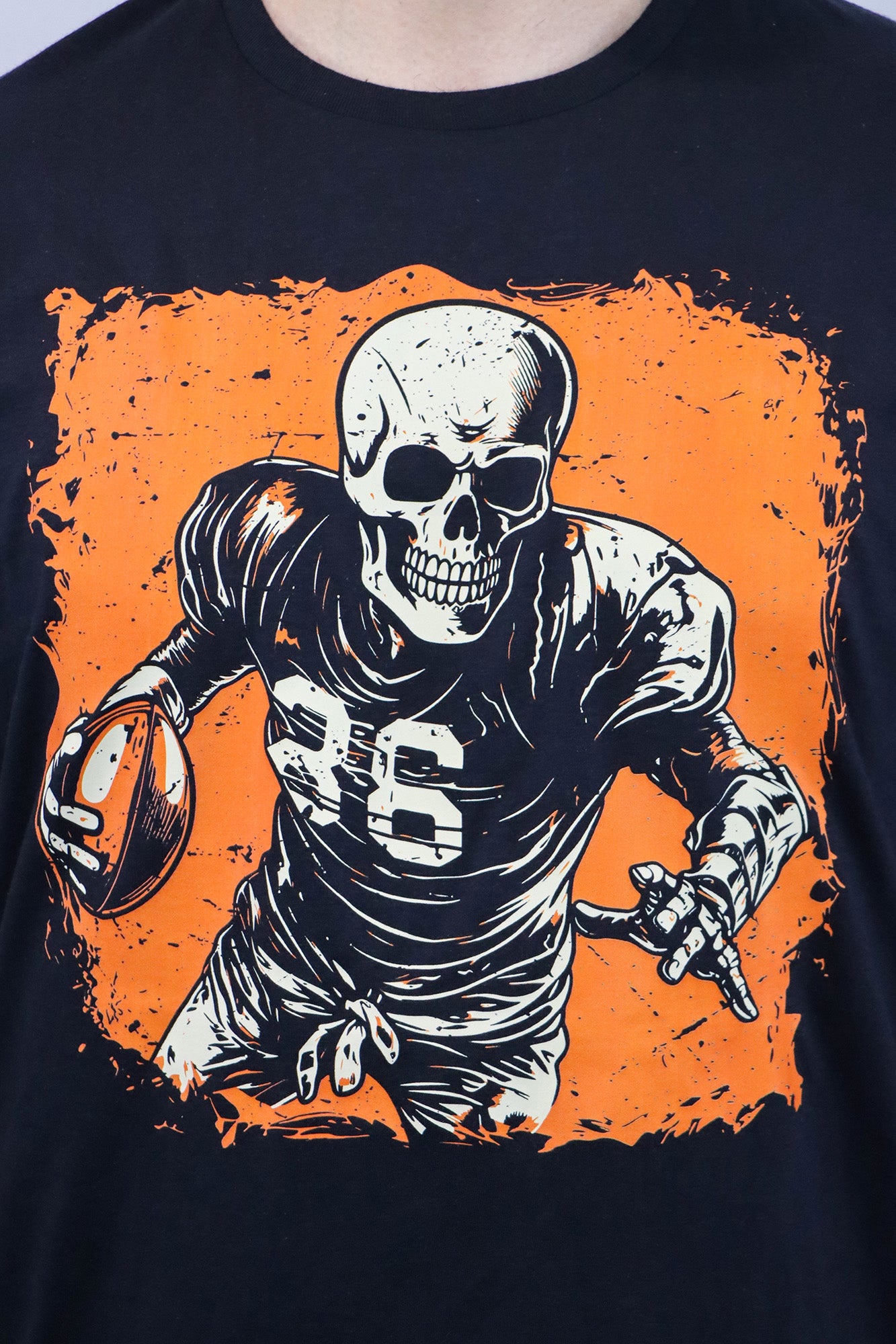 Football 2 Skeleton (orange & black) Unisex Short Sleeve Tee- Black
